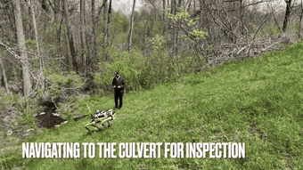 Animated view of the robot traversing down the bank and entering the culvert